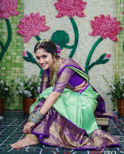 "Floral Symphony: The Majestic Green and Purple Saree"