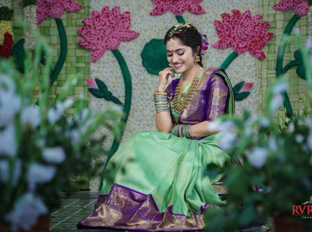 "Floral Symphony: The Majestic Green and Purple Saree"