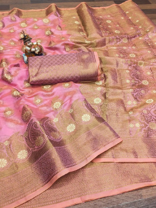 "Elegant Tapestry: Pink Saree with Intricate Designs"