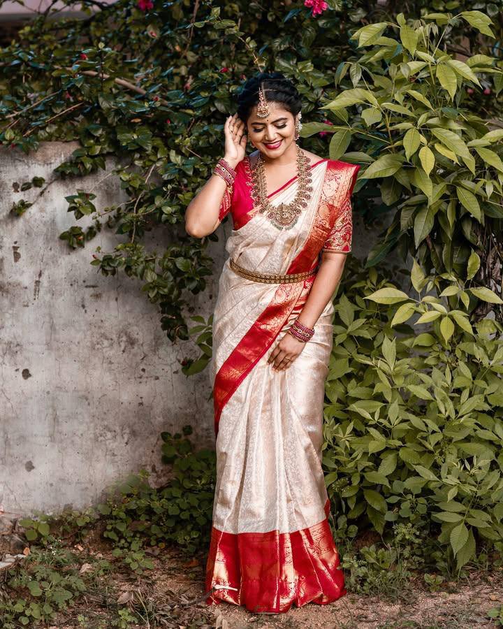 "Regal Rose: The Stunning Cream and Red Silk Drape Saree"