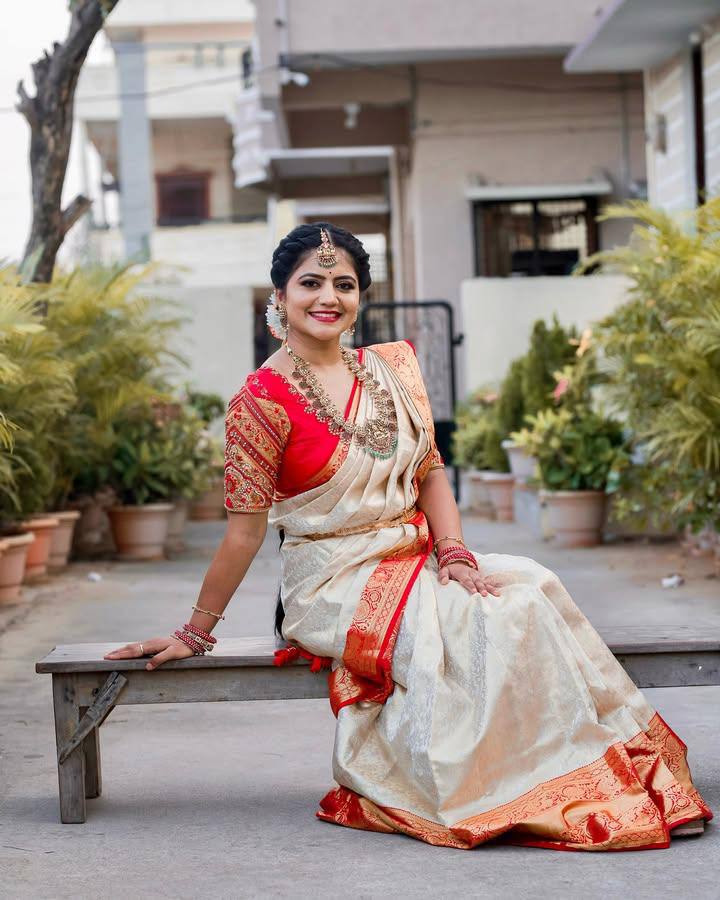 "Regal Rose: The Stunning Cream and Red Silk Drape Saree"