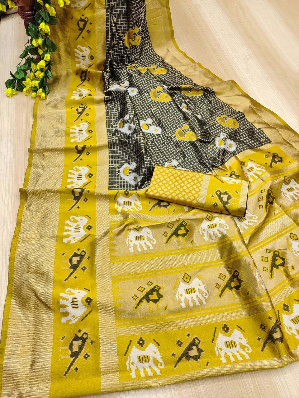 "Verdant Glow: Embracing Tradition with a Yellow and Green Saree"