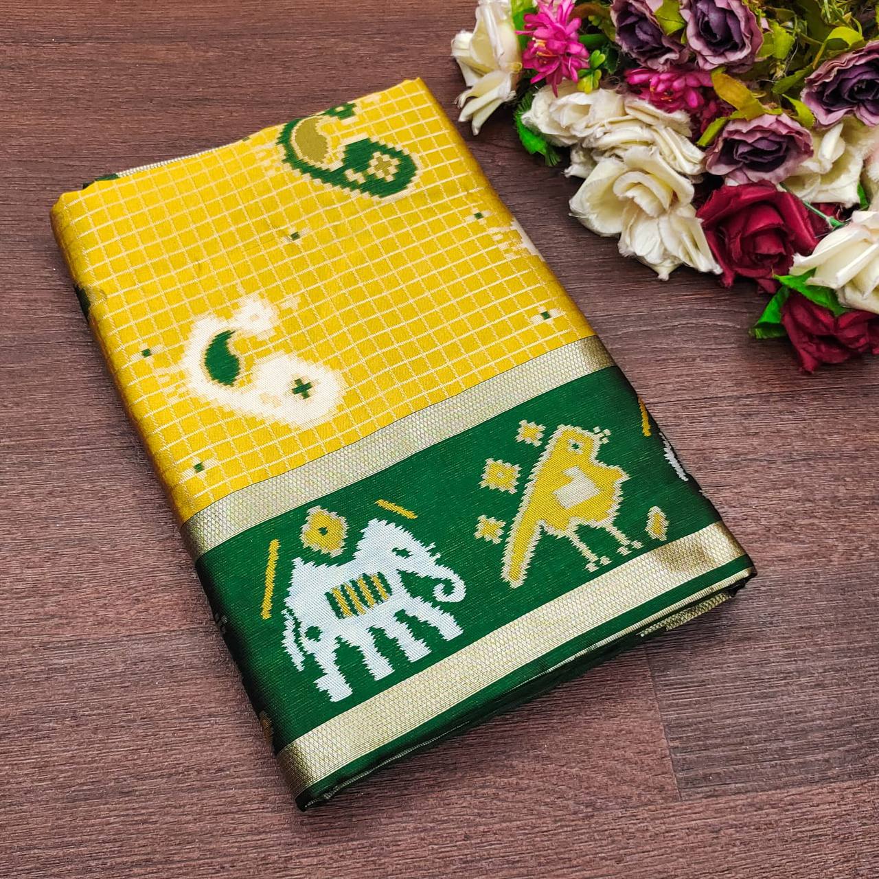 "Verdant Glow: Embracing Tradition with a Yellow and Green Saree"