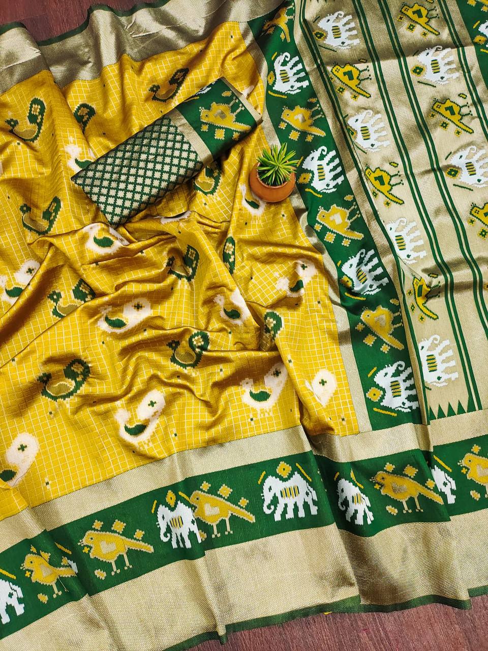 "Verdant Glow: Embracing Tradition with a Yellow and Green Saree"