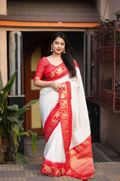 "Sapphire Elephants: The Charming White and Pink Saree"