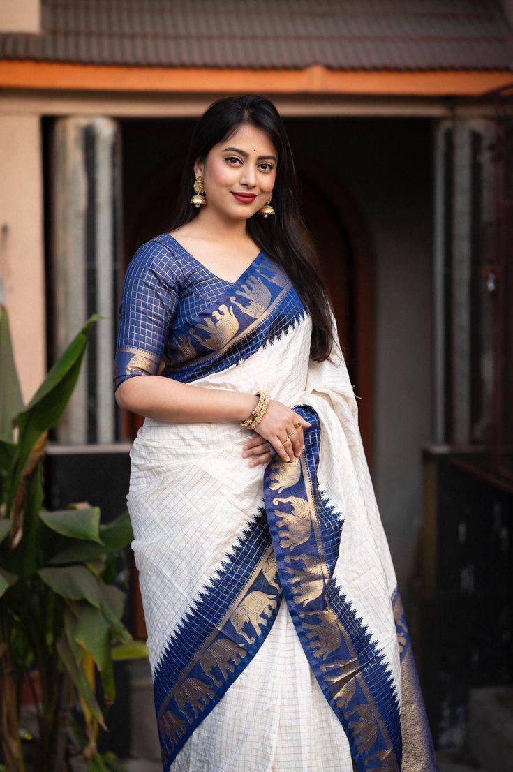 "Sapphire Elephants: The Charming White and Pink Saree"