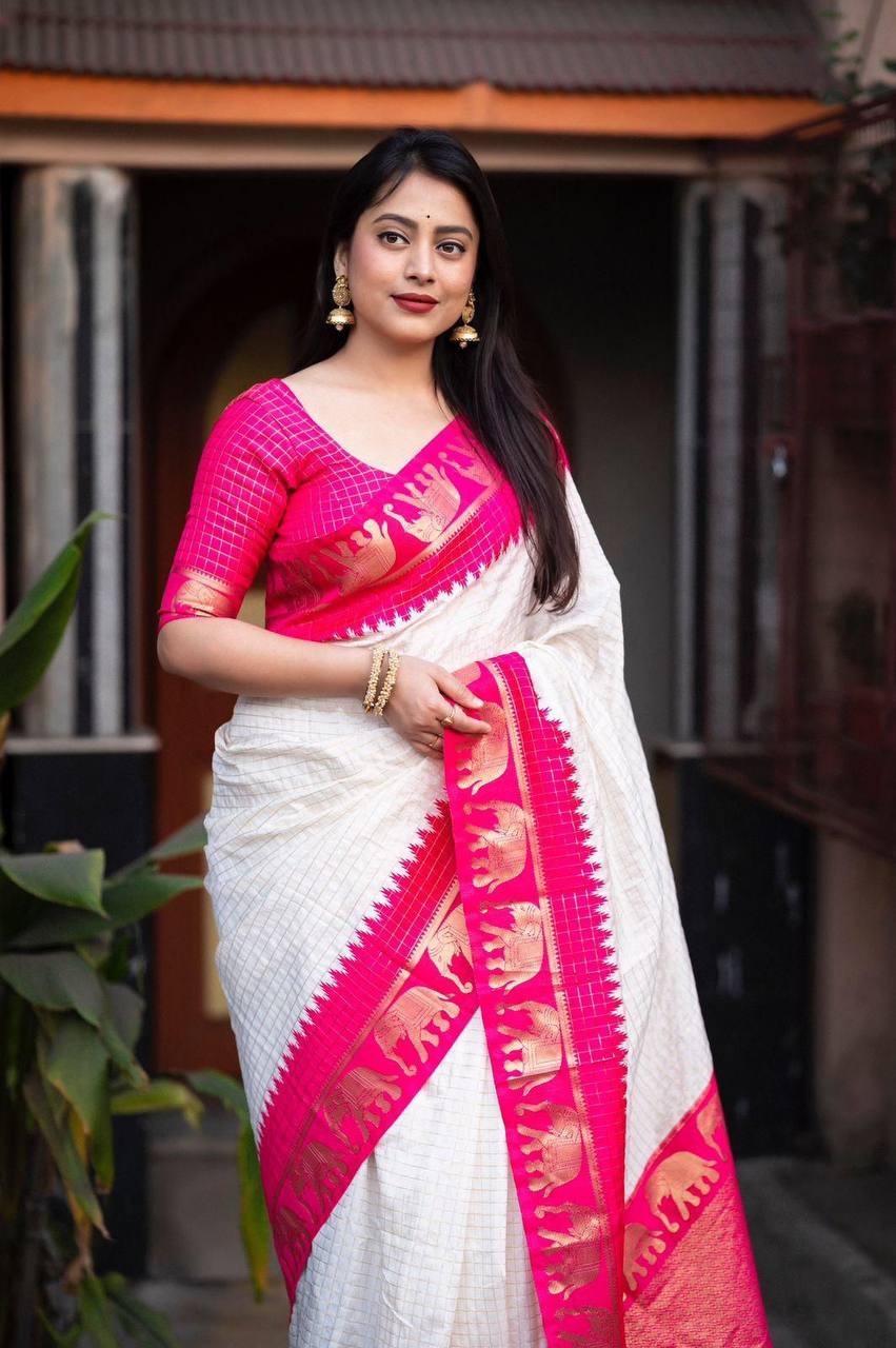 "Sapphire Elephants: The Charming White and Pink Saree"