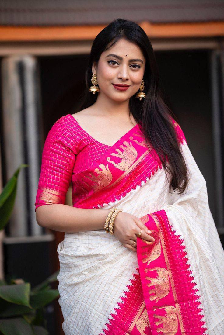 "Sapphire Elephants: The Charming White and Pink Saree"