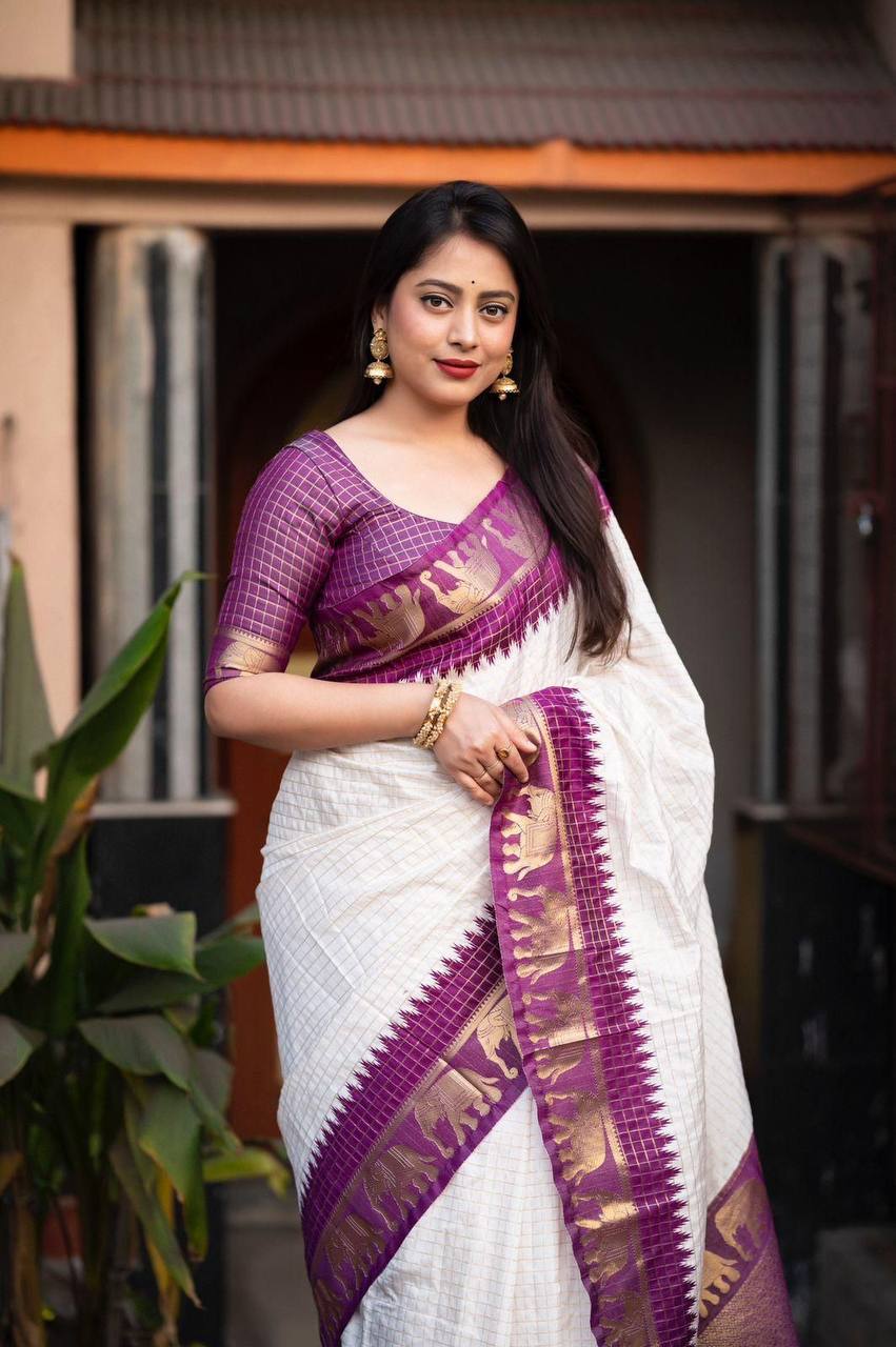 "Sapphire Elephants: The Charming White and Pink Saree"