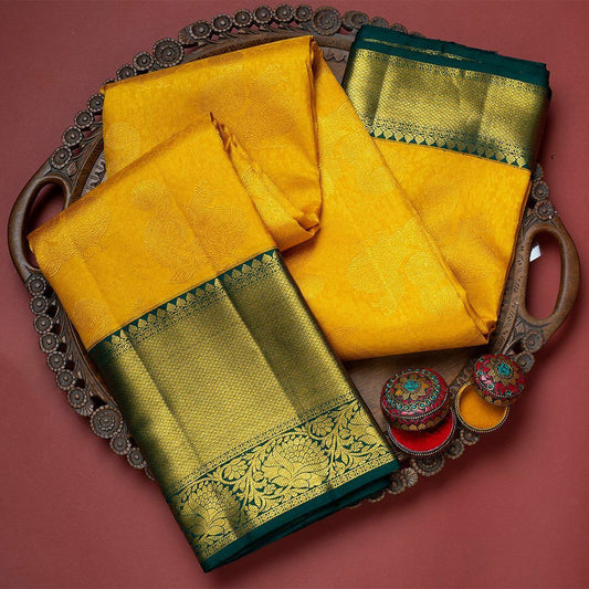 "Luminous Fields: The Exquisite Yellow and Green Silk Saree"