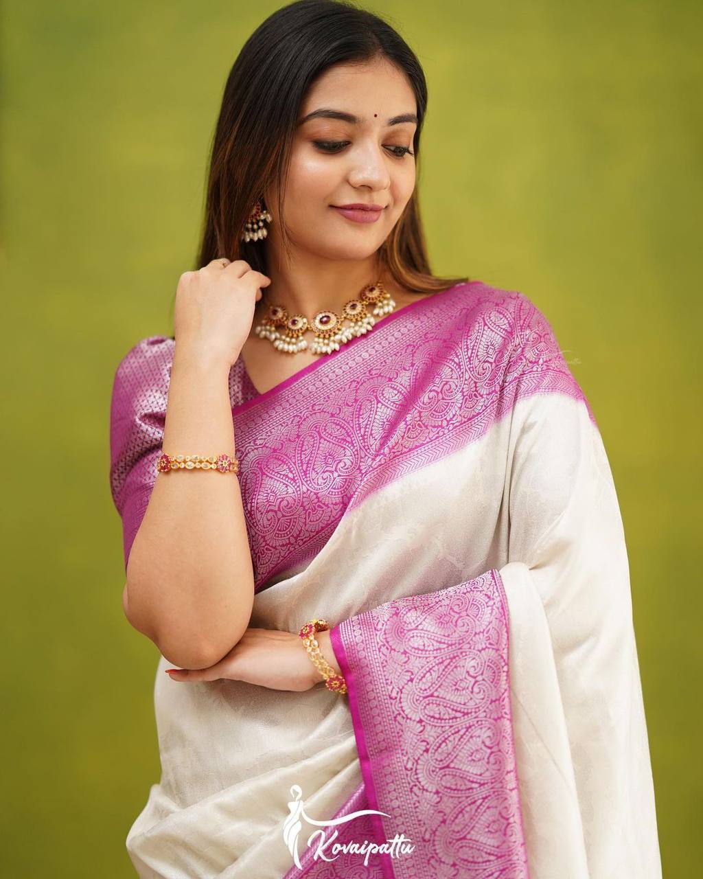 "Cherry Ivory: The Captivating White and Pink Silk Attire Saree"