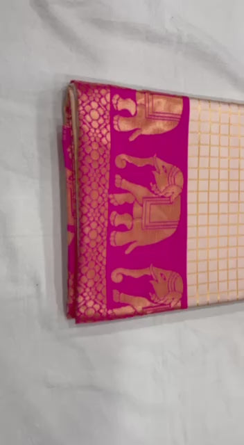 "Sapphire Elephants: The Charming White and Pink Saree"